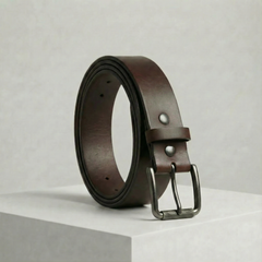 Bellvari Timberline full-grain leather belt with gunmetal knurled-roller buckle on a neutral background. — view 1