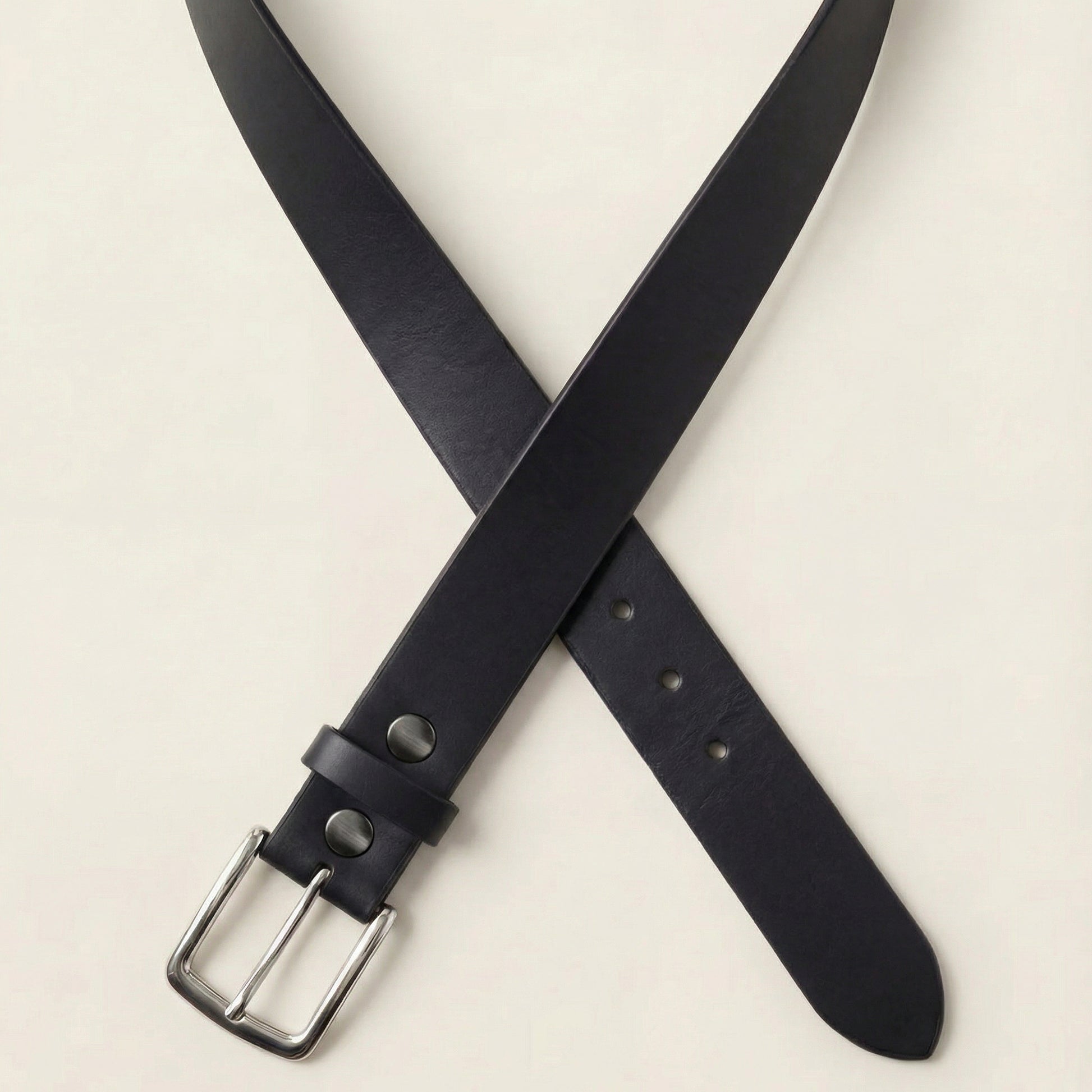 Bellvari Maverick black leather belt detail of brushed steel buckle.